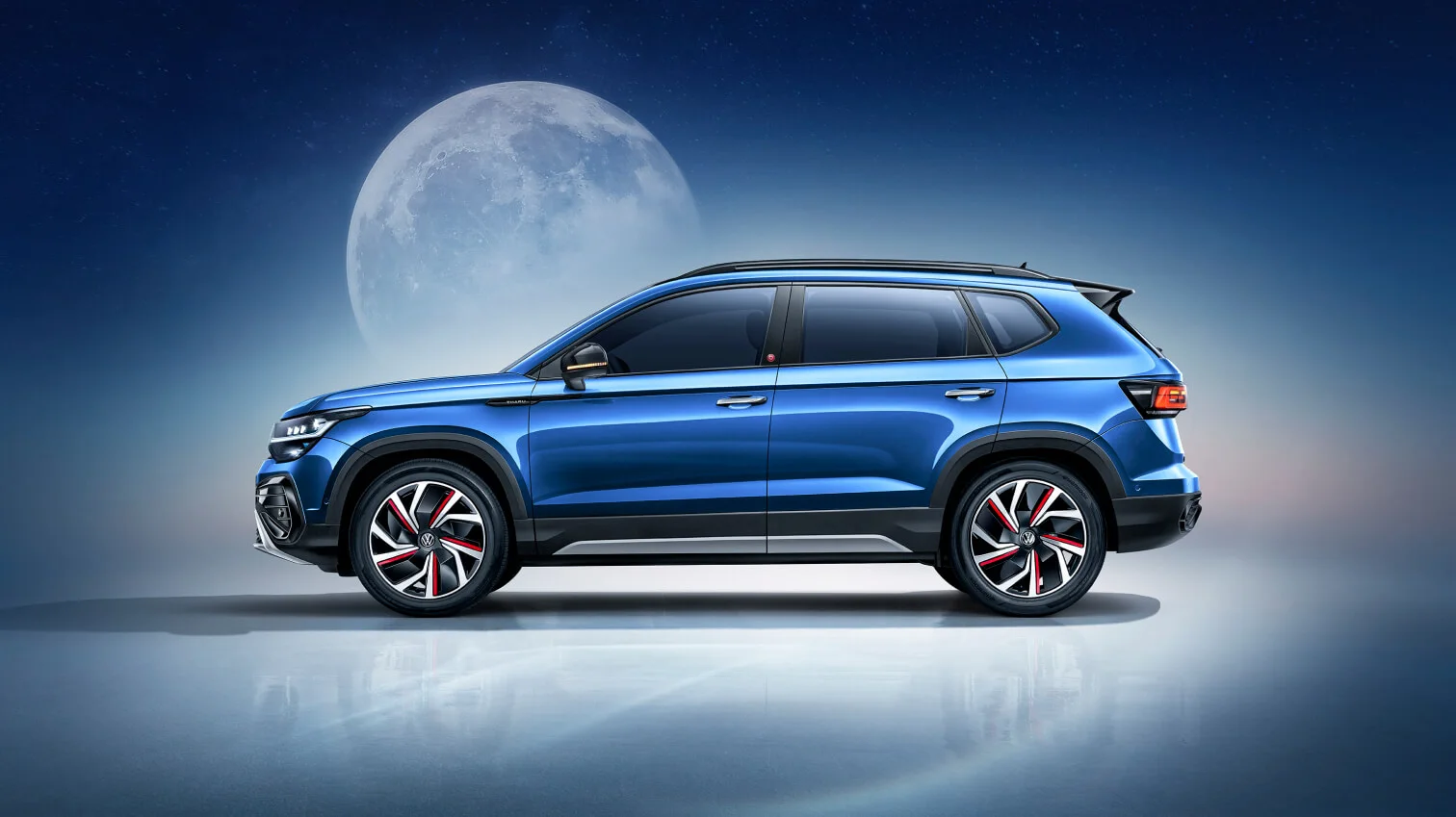 Синий Volkswagen New Tharu: вид сбоку